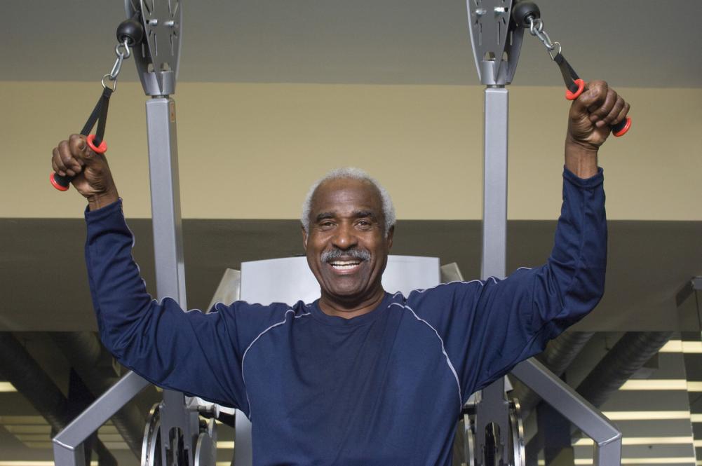 man exercising in gym